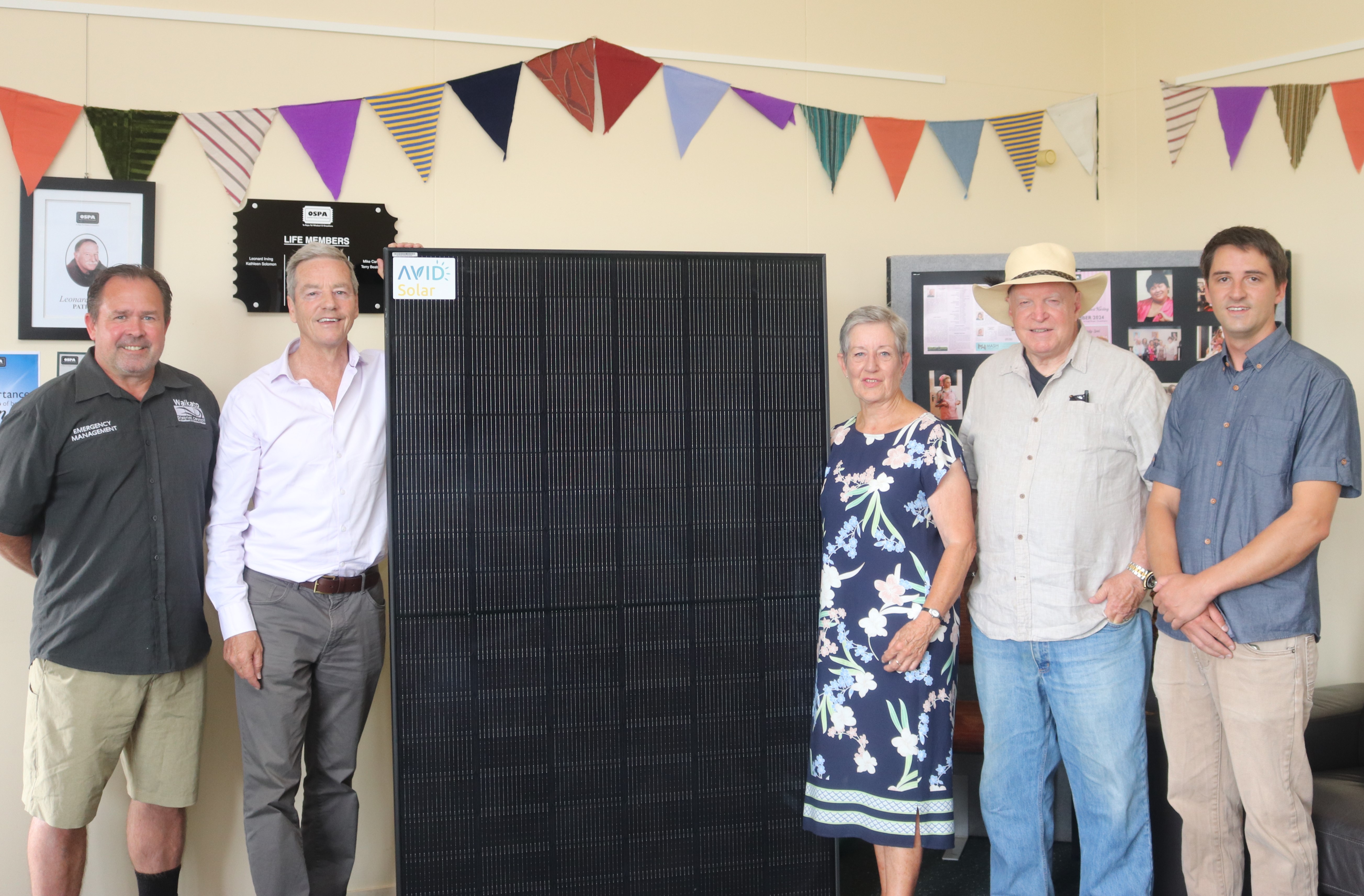 Image of people at the Solar Panel unveiling at Onewhero hall