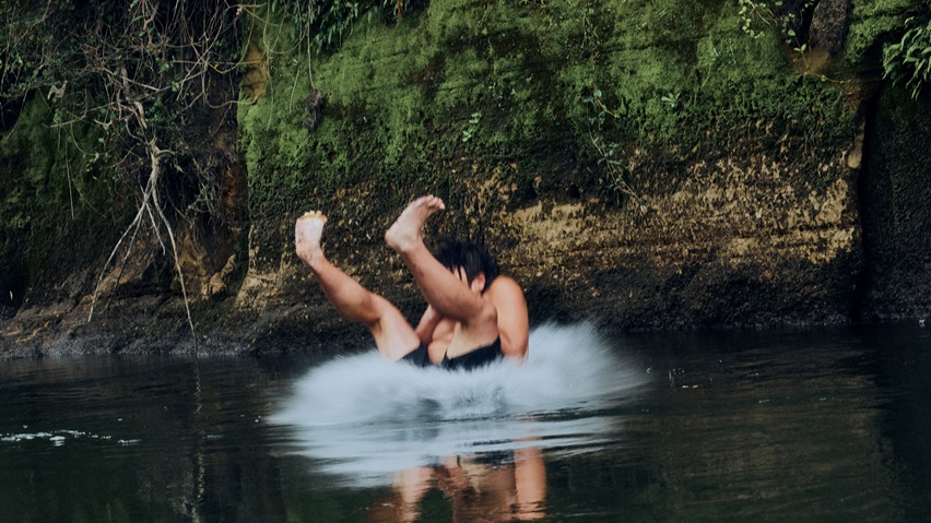 Manu in the river