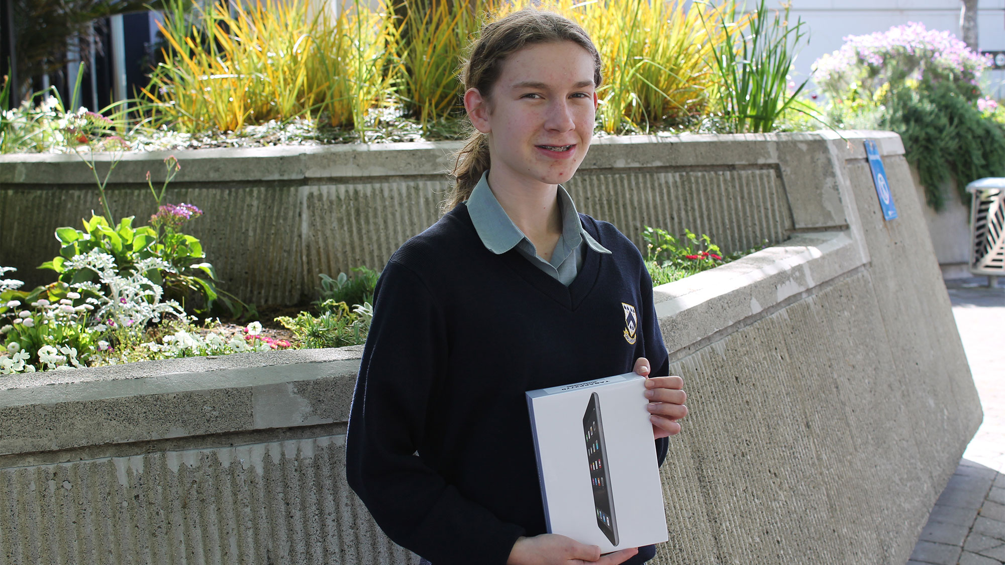 Pictured: iPad mini winner Capril Mawston with her prize.