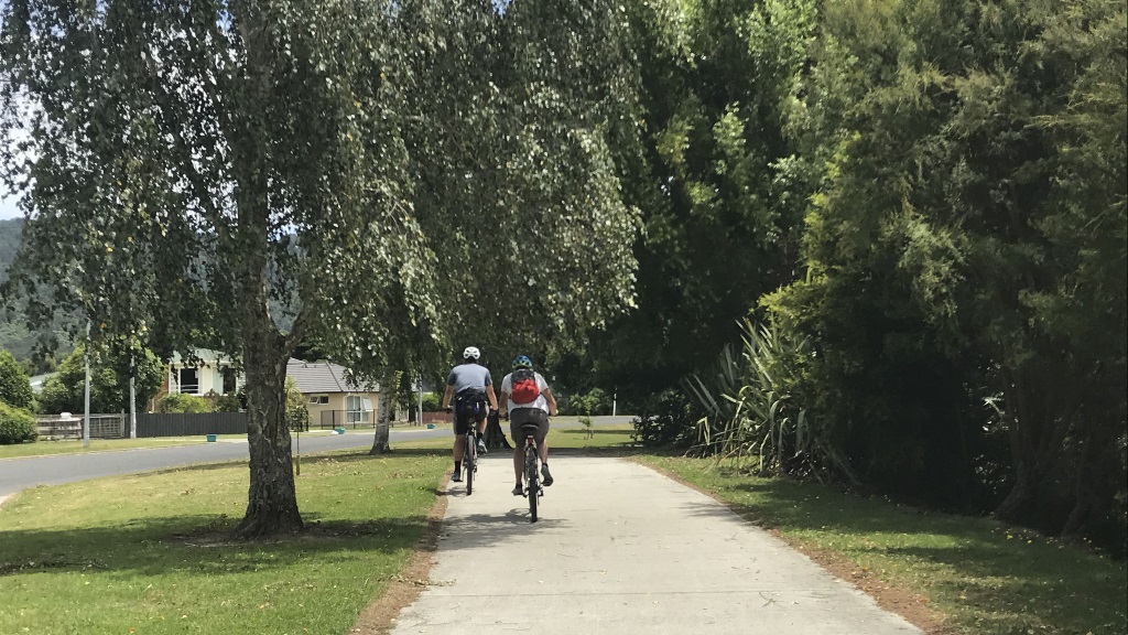 Cyclists on Waikato Esplanade 16x9 crop Cyclists on Waikato Esplanade, Ngaruawahia